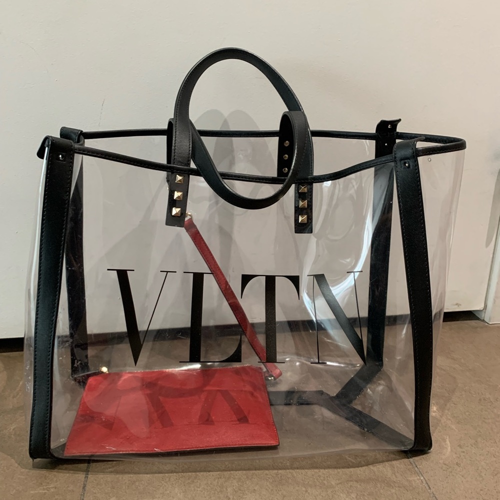Valentino Garavani transparent tote bag. Metallic rock studs and VLTN logo.